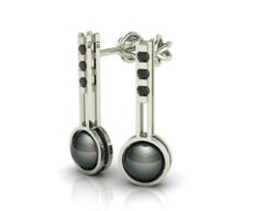 Bílé zlato, černé brilianty a černá perla.